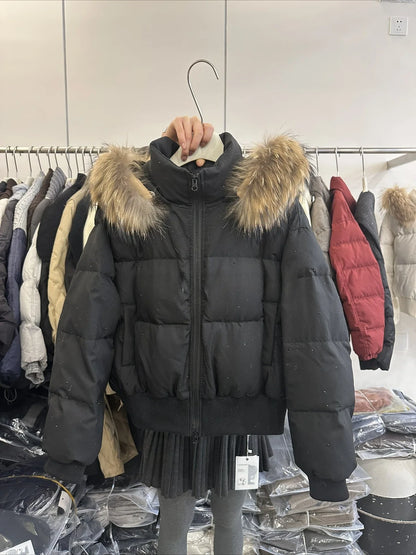 Women's quilted jacket with faux-fur hood and glitter details