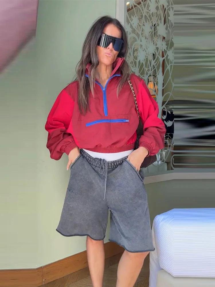 Sporty cropped pullover windbreaker jacket with zipper