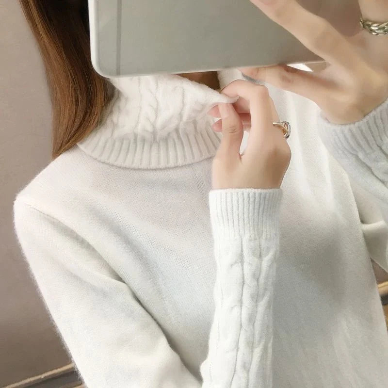 Women's turtleneck knitted sweater with cable-knit sleeves