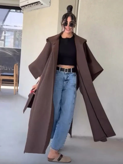 Women's long brown coat with loose oversized fit
