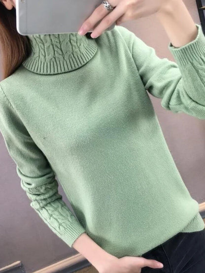 Women's turtleneck knitted sweater with cable-knit sleeves