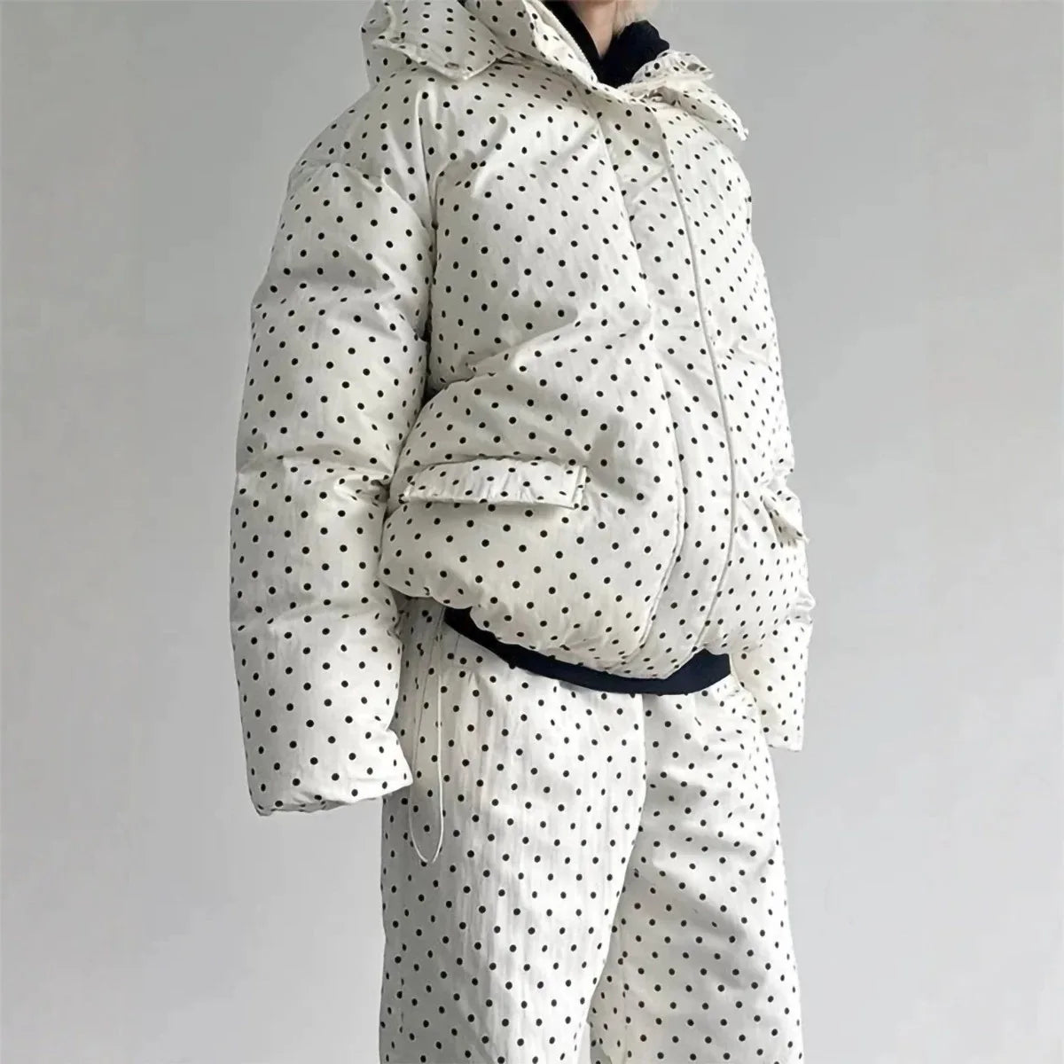 Striped quilted jacket with hood and matching trousers