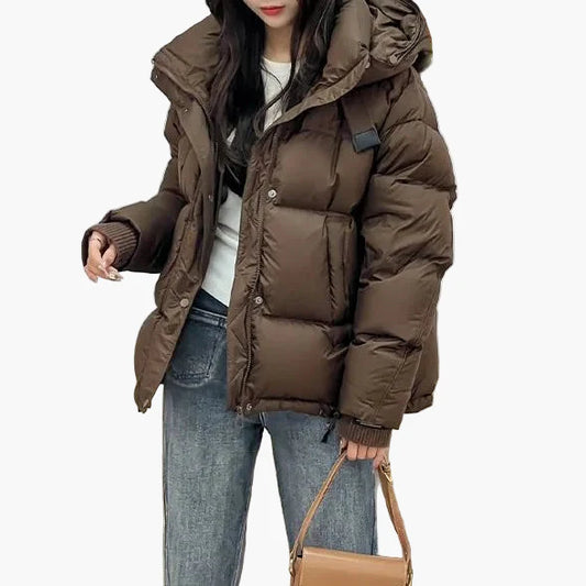 Women's winter quilted jacket with hood – fashionable warm outdoor jacket for everyday and leisure use