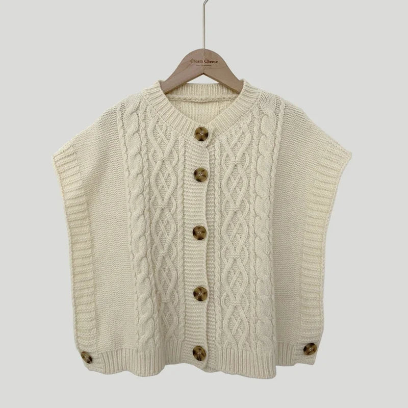 Women's cropped sleeveless cardigan with cable knit pattern, crew neck, and button placket