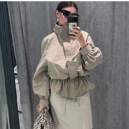 Women's beige jacket with drawstring and blouson sleeves