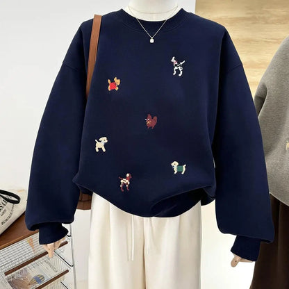 Women's crew-neck long-sleeve sweatshirt with embroidered dog motifs