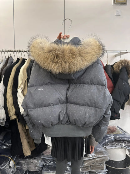 Women's quilted jacket with faux-fur hood and glitter details