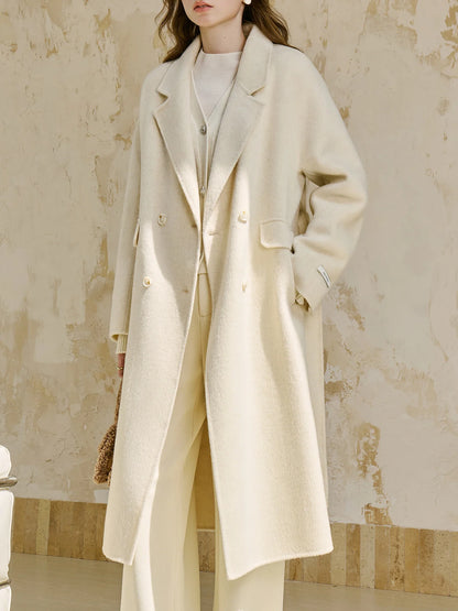 Women's long coat with tie belt and notched lapel