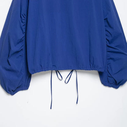 Blue women's blouse with stand-up collar and drawstring hem