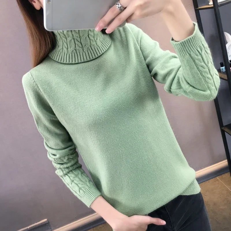 Women's turtleneck knitted sweater with cable-knit sleeves