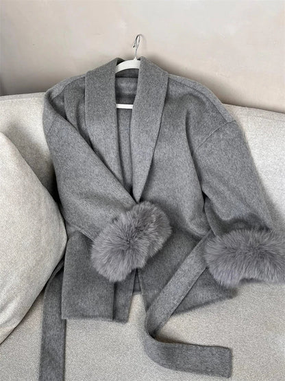 Short women's wrap coat with faux-fur sleeves and tie belt