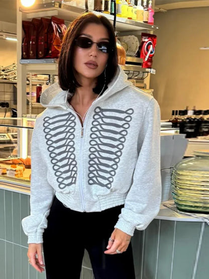 Short women's hoodie with zipper and decorative trims