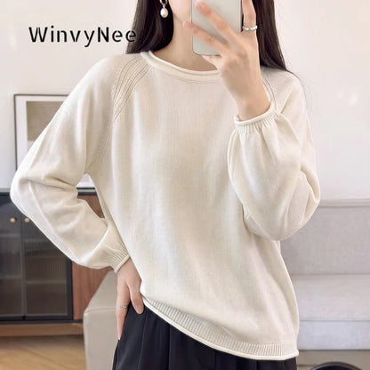 Women's crew-neck long-sleeve knit sweater with raglan sleeves and cuffs