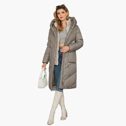 Women's winter quilted coat with hood – fashionable long parka for cold days