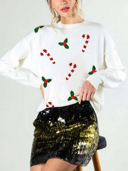 Women's green Christmas sweater with candy cane & holly motif