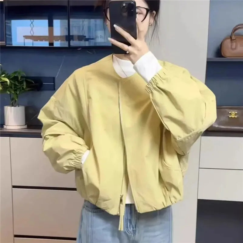 Women's short-sleeve bomber jacket with crew neck and zipper
