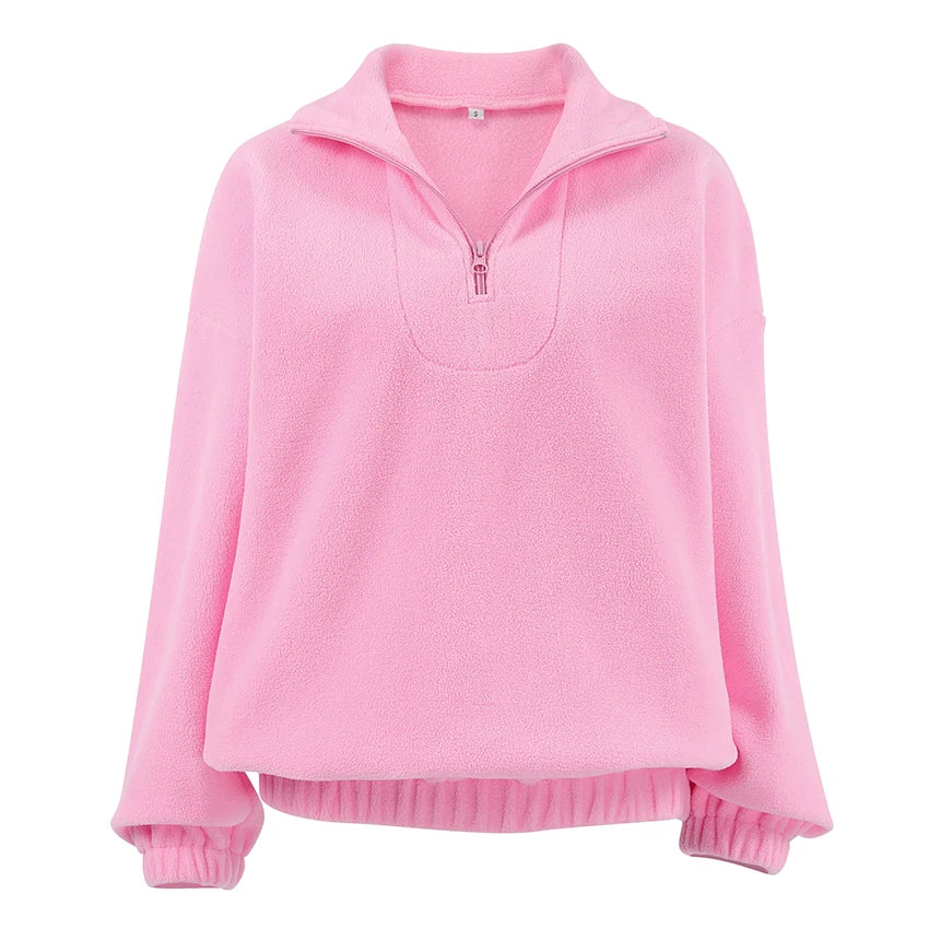 Women's pink fleece pullover with zip-up stand collar and long sleeves