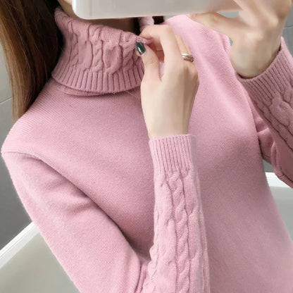 Women's turtleneck knitted sweater with cable-knit sleeves