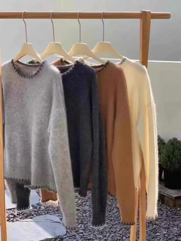 Women's crew-neck long-sleeve gray knit sweater with decorative trim