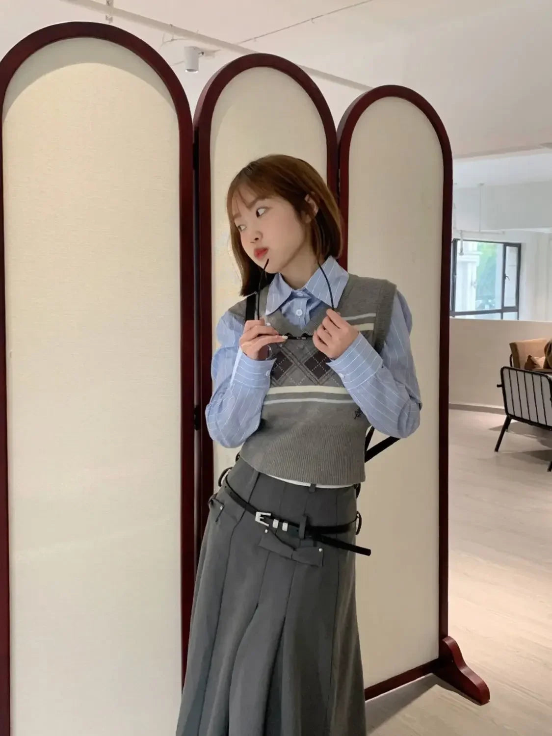 Women's gray midi pleated skirt with argyle knitted vest and shirt set