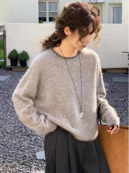 Women's crew-neck long-sleeve gray knit sweater with decorative trim