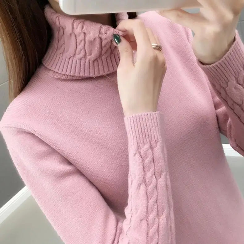 Women's turtleneck knitted sweater with cable-knit sleeves