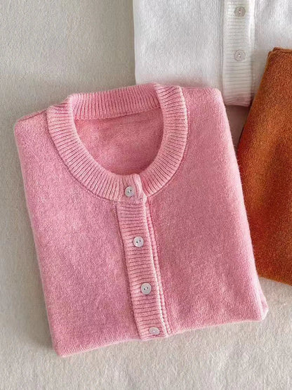 Women's knitted cardigan with round neck and button placket