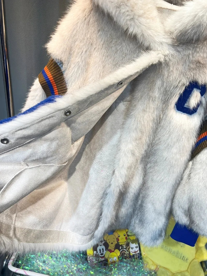 Unisex faux-fur hooded jacket with appliqué and removable pocket, cream & blue