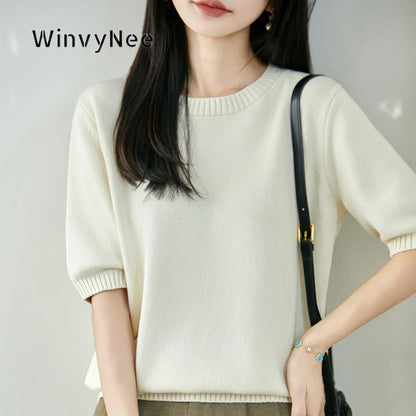 Women's short-sleeve crew-neck knit sweater with ribbed cuffs