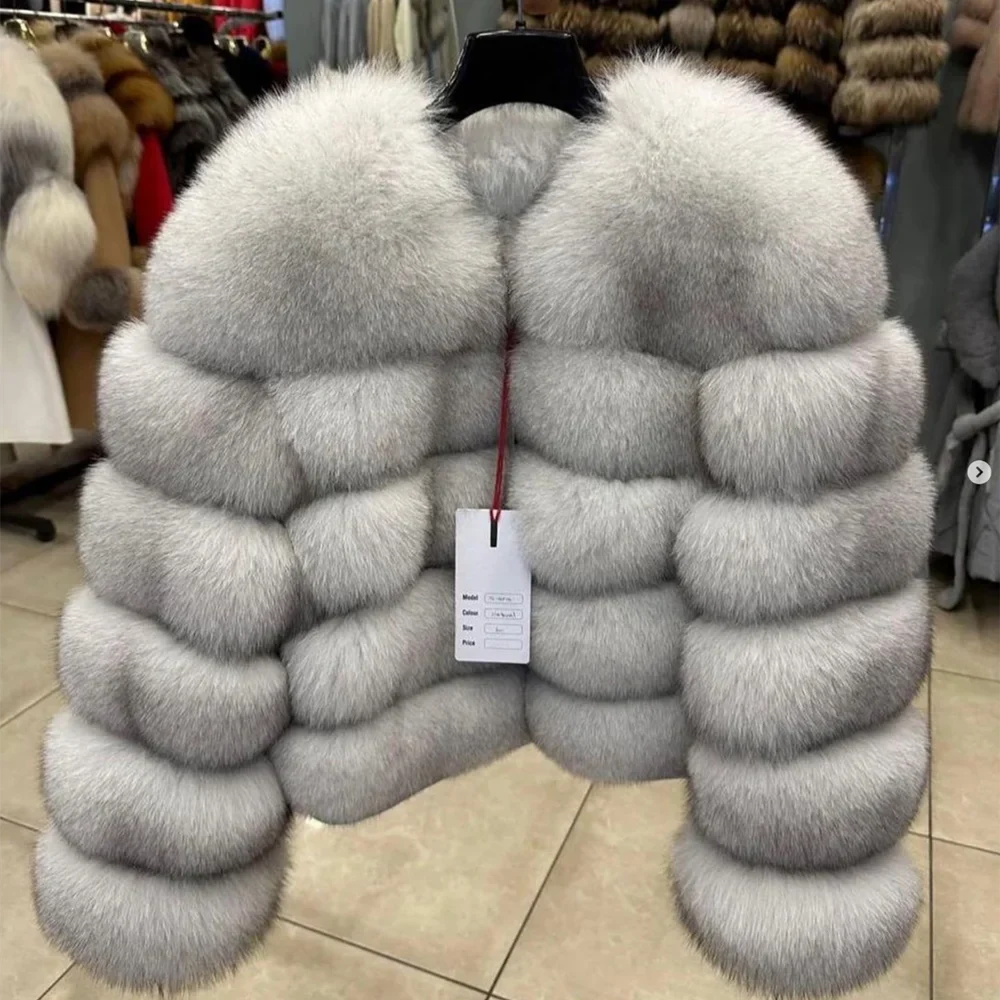 Women's faux fur jacket with voluminous sleeves and high collar