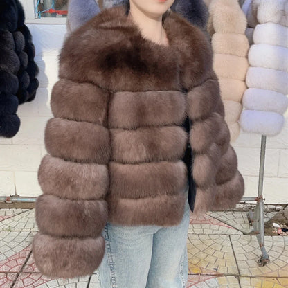 Women's faux fur jacket with voluminous sleeves and high collar