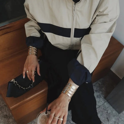 Women's cropped jacket with zipper, stand collar, and block stripes