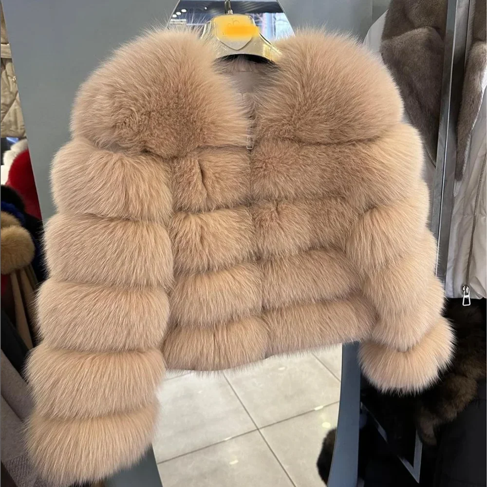 Women's faux fur jacket with voluminous sleeves and high collar