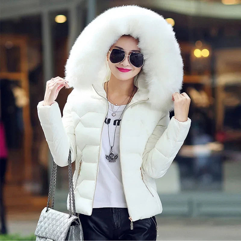 Women's quilted jacket with faux fur hood and zippers