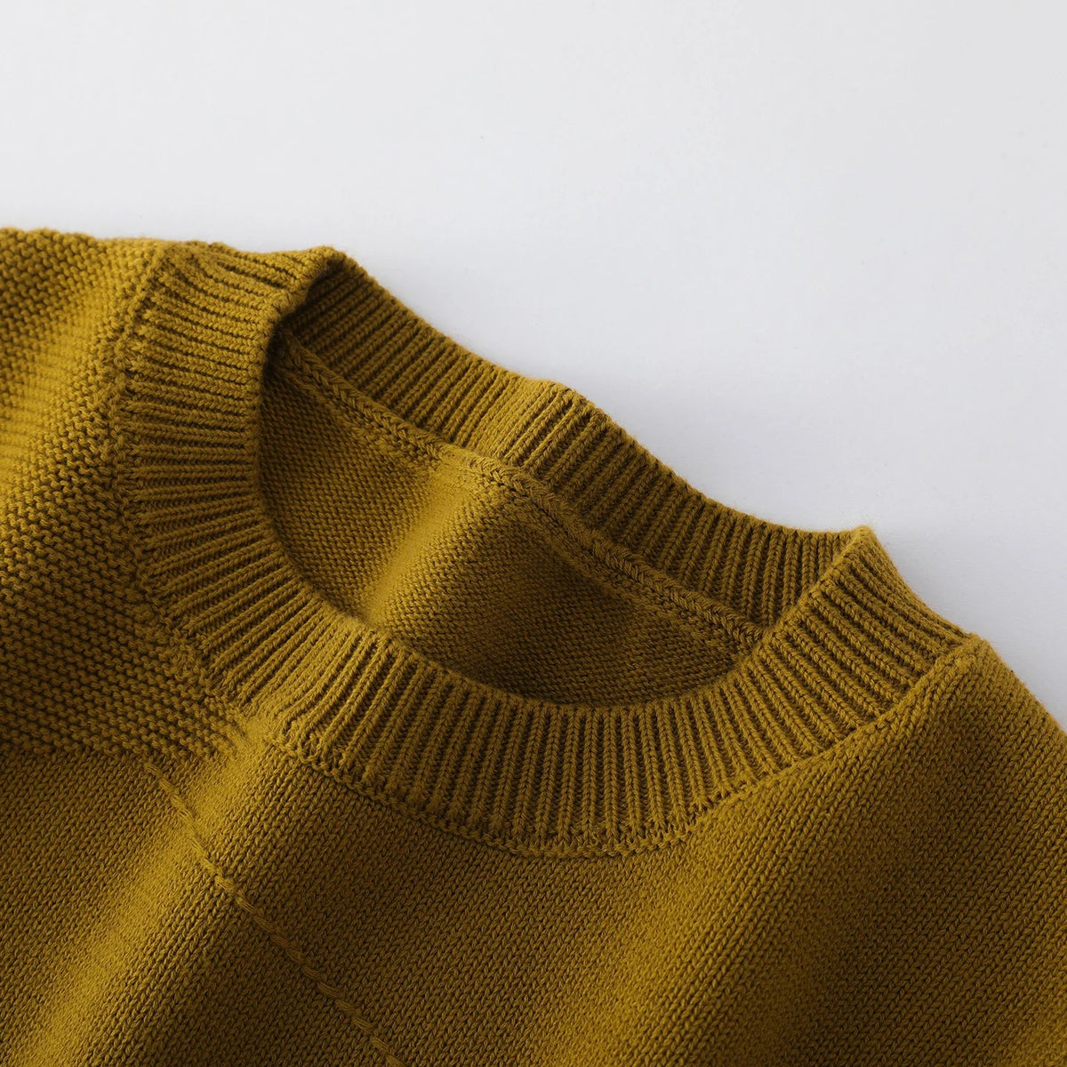 Women's crew-neck long-sleeve sweater with a textured pattern in green