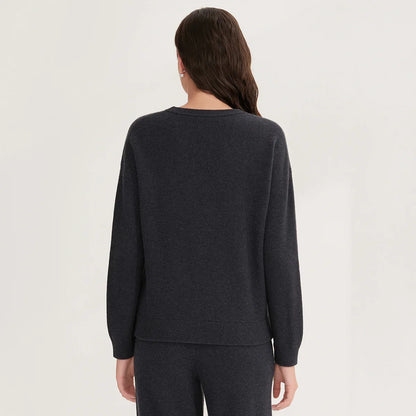 Women's crew-neck sweater with chest pocket and stripes