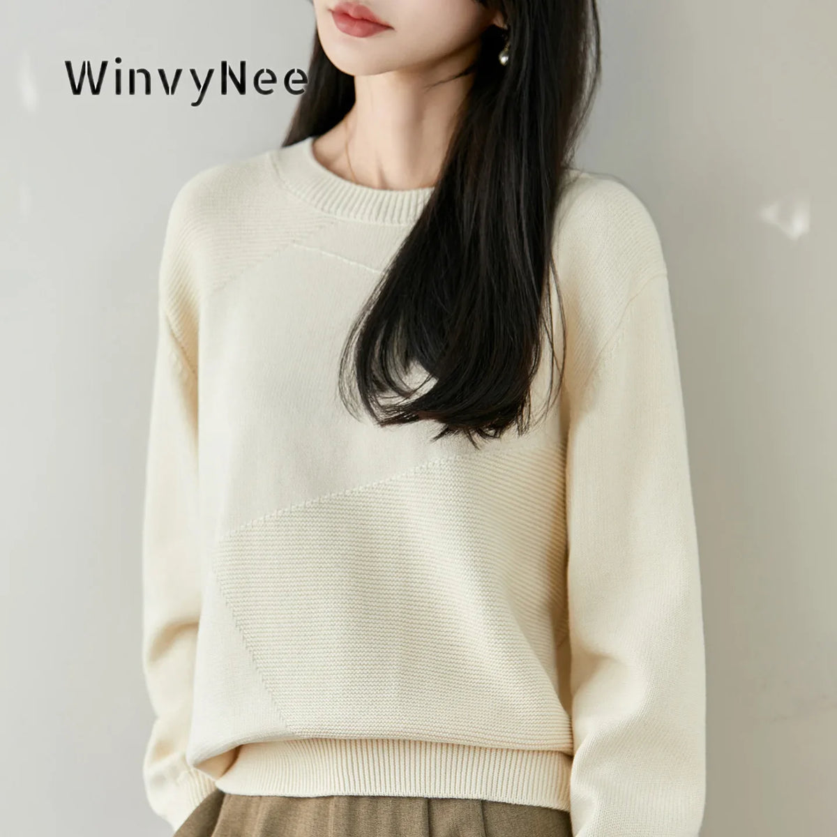 Women's crew-neck long-sleeve knit sweater with textured details