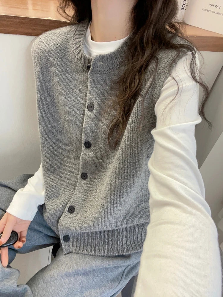 Women's knitted vest with button placket, round neckline, and rib-knit hem