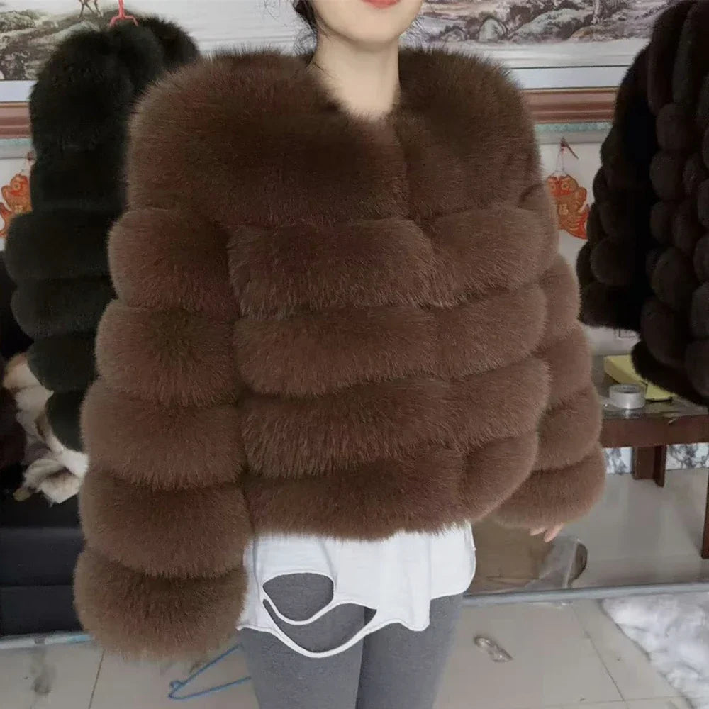 Women's faux fur jacket with voluminous sleeves and high collar