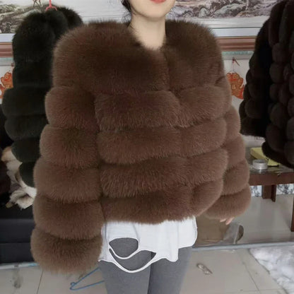 Women's faux fur jacket with voluminous sleeves and high collar