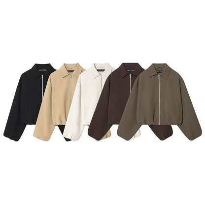 Short women's bomber jacket with collar, zipper, and long sleeves