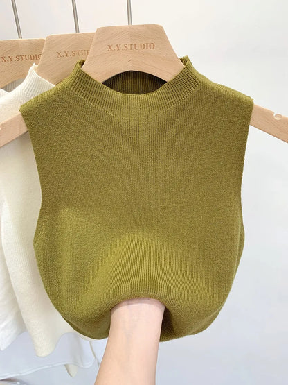 Ribbed knitted sleeveless top with stand collar
