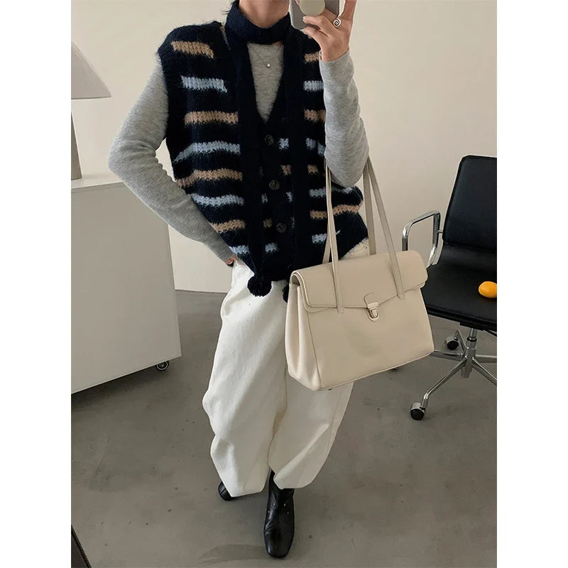 Striped knitted vest with V-neck and buttons, cropped fit