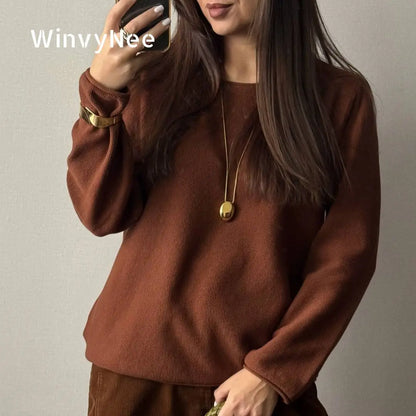 Women's crew-neck long-sleeve sweater with a knit-look texture