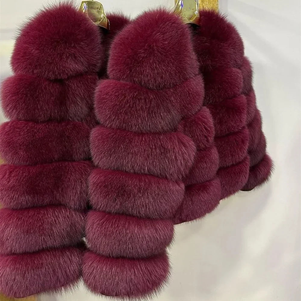 Women's faux fur jacket with voluminous sleeves and high collar