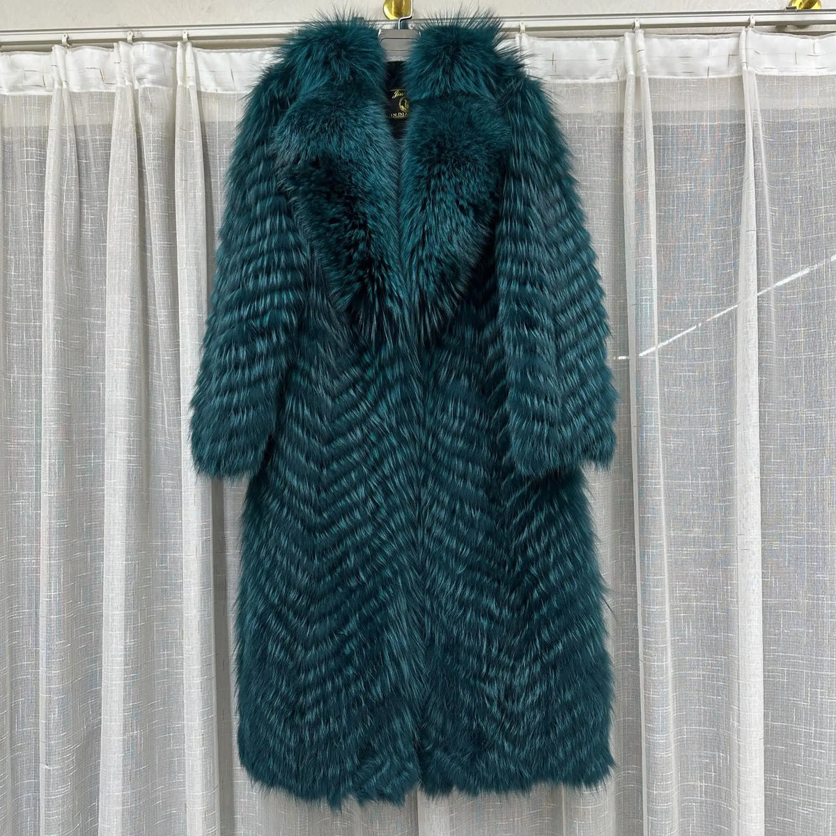 Long women's faux-fur coat with chevron pattern, warm winter coat