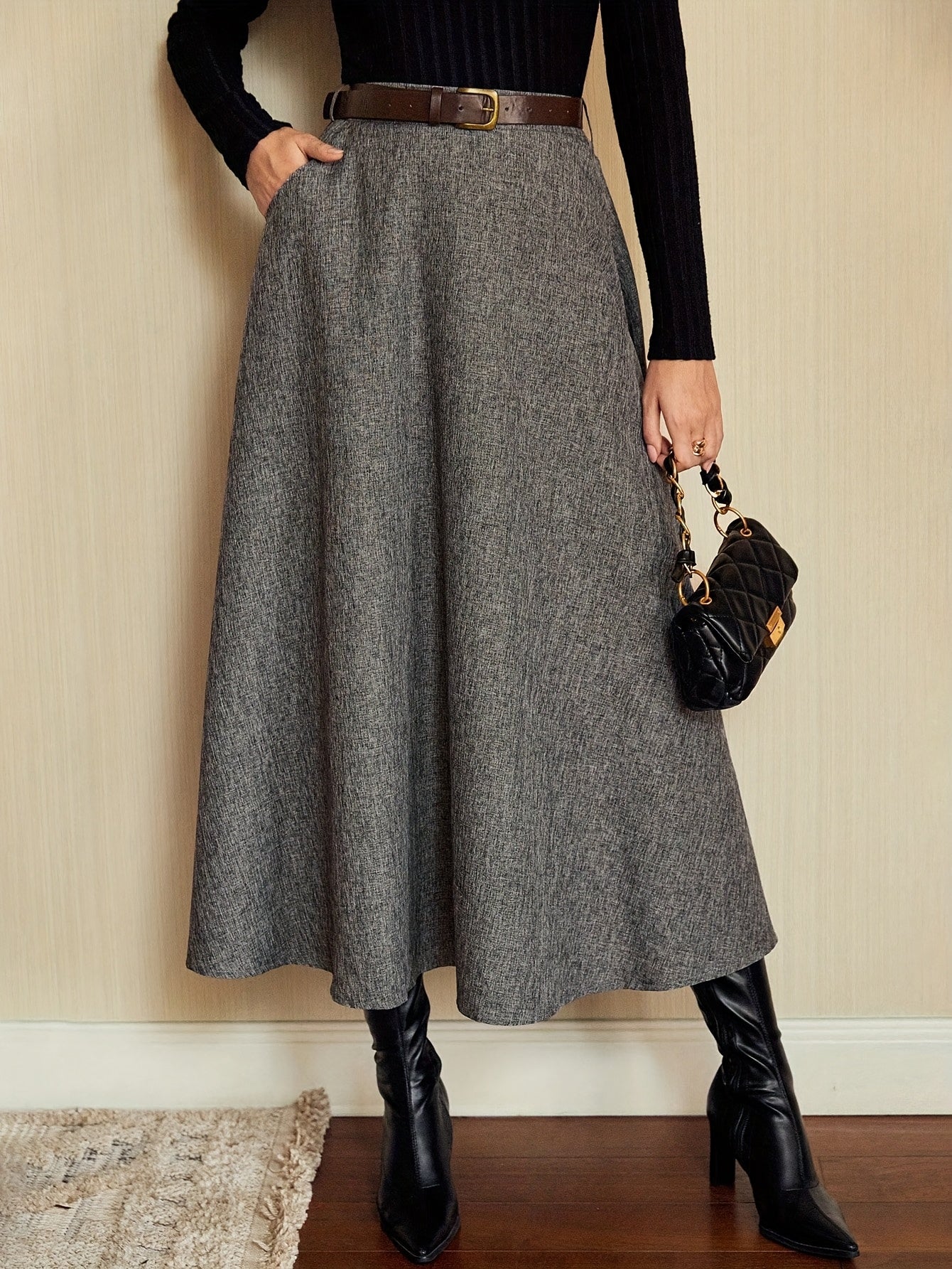Women's gray A-line midi skirt with a flared hem
