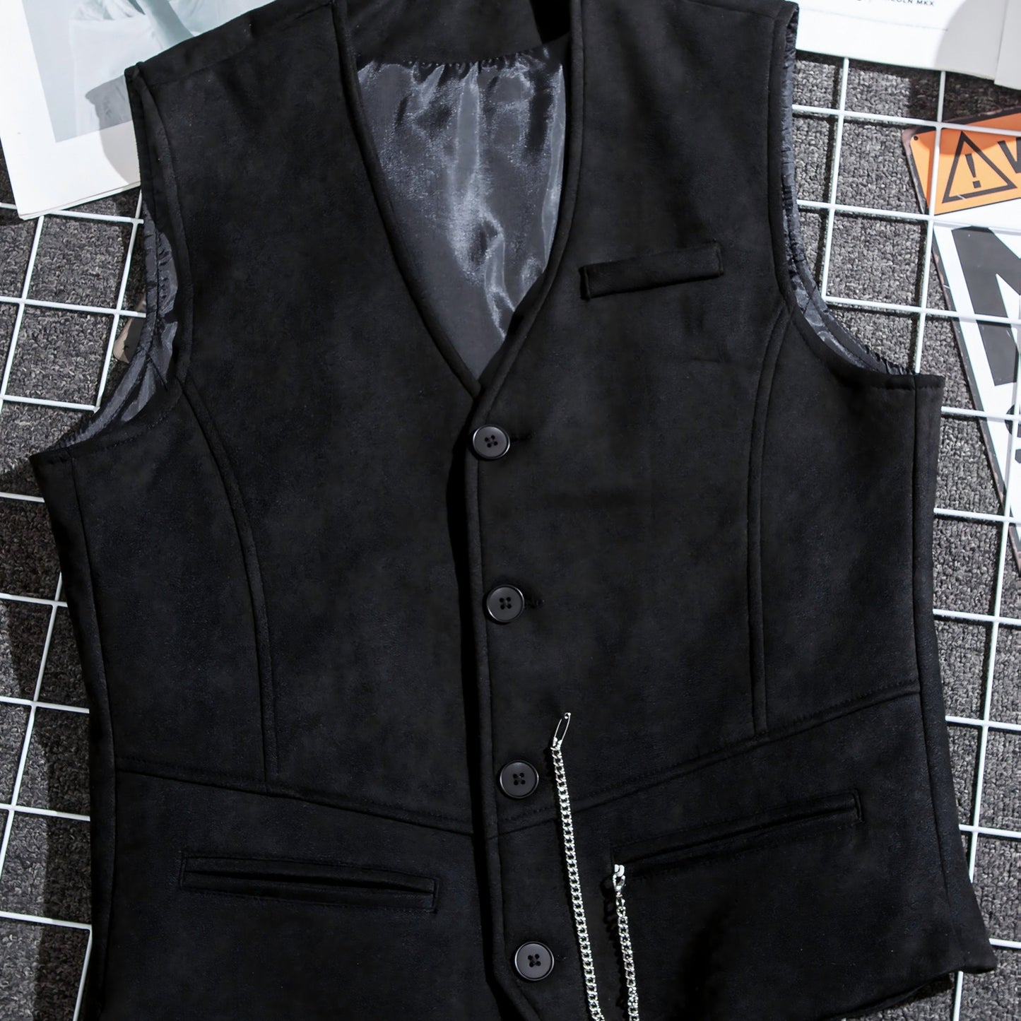 Men's vest with V-neck, button placket, and chain detail
