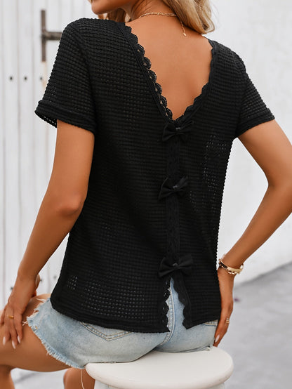 Women's short-sleeve top with lace back cutout and bow – feminine style for casual wear and summer