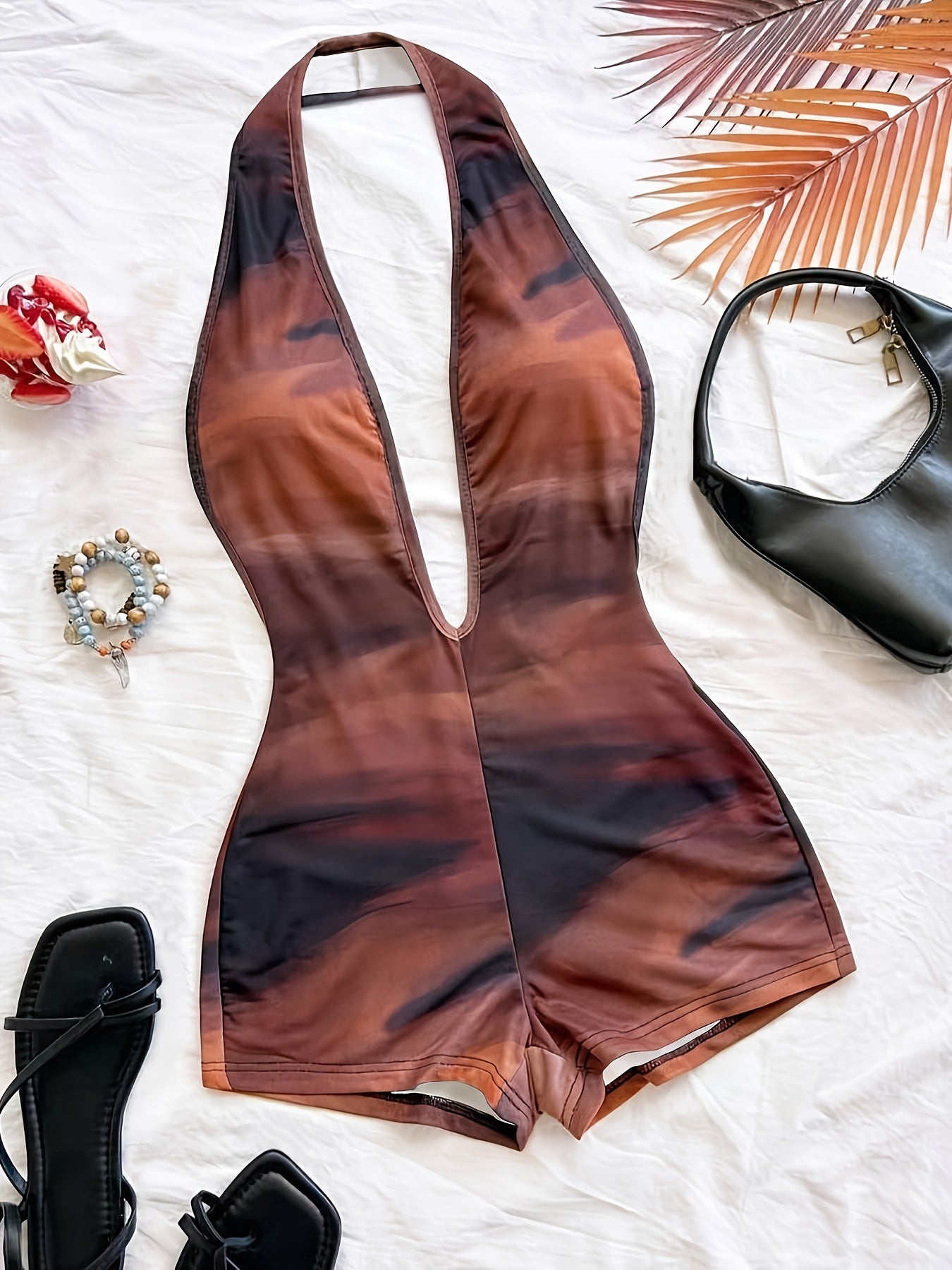 Women's jumpsuit with animal print and deep neckline – fashionable one-piece for summer, beach & party